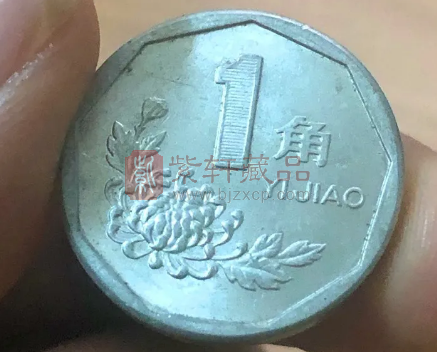 以前使用的菊花硬币，若是这个年份，一卷价值1400元！